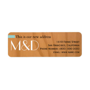 our new address, monogram
