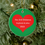 Our Second Christmas Together 2023 Cute Red Heart  Ceramic Ornament<br><div class="desc">Personalized names and printed with cute red heart design in solid green background. Feel free to customize by adding your own texts,  names or photos. You can add your photo on the back side of the ornament easily!
The colour of the background can also be changed as you want.</div>