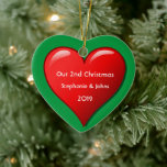 Our Second Christmas Together Cute Red Heart 2019 Ceramic Ornament<br><div class="desc">Personalized names and printed with cute red heart design in solid green background. Feel free to customize by adding your own texts,  names or photos. You can add your photo on the back side of the ornament easily!
The colour of the background can also be changed as you want.</div>