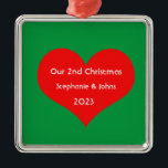 Our Second Christmas Together Cute Red Heart 2023  Metal Ornament<br><div class="desc">Personalized names and printed with cute red heart design in solid green background. Feel free to customize by adding your own texts,  names or photos. You can add your photo on the back side of the ornament easily!
The colour of the background can also be changed as you want.</div>