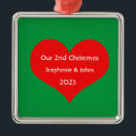 Our Second Christmas Together Cute Red Heart 2023  Metal Ornament<br><div class="desc">Personalized names and printed with cute red heart design in solid green background. Feel free to customize by adding your own texts,  names or photos. You can add your photo on the back side of the ornament easily!
The colour of the background can also be changed as you want.</div>