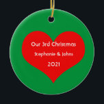 Our Third Christmas Together Cute Red Heart 2021 Ceramic Ornament<br><div class="desc">Personalized names and printed with cute red heart design in solid green background. Feel free to customize by adding your own texts,  names or photos. You can add your photo on the back side of the ornament easily!
The colour of the background can also be changed as you want.</div>