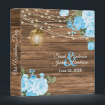 Our Wedding | Wood, Lantern & Baby Blue Flower Binder<br><div class="desc">Wedding Photo Album or Planner featured in a rustic wood background with beautiful baby blue rose and tulip flowers, a glowing lantern and trendy string lights ready for you to personalize. ⭐This Product is 100% Customizable. Graphics and / or text can be added, deleted, moved, resized, changed around, rotated, etc......</div>