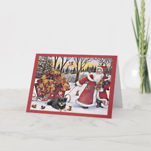 Ours de Père Noël de carte de Noël de rottweiler
