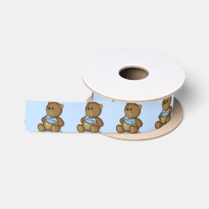 Ours en peluche avec bib sur ruban en satin bleu