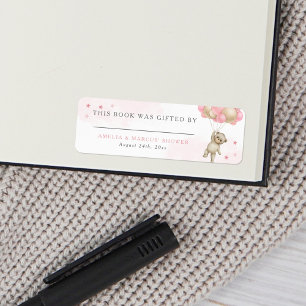 Ours en peluche Livre rose offert par
