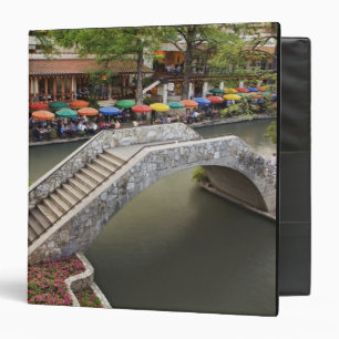 Outdoor cafe along River Walk and bridge over 2 Binder