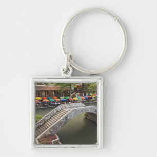 Outdoor cafe along River Walk and bridge over 2 Keychain