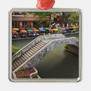 Outdoor cafe along River Walk and bridge over 2 Metal Ornament