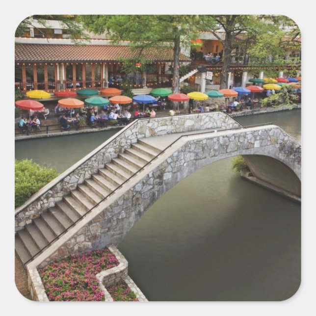 Outdoor cafe along River Walk and bridge over 2 Square Sticker (Front)