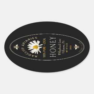 Oval honey label with heraldic bees and daisy