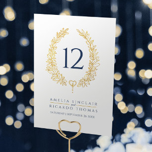 Oval wreath leaf gold on white blue text wedding table number