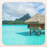Over-water bungalow, Bora Bora coaster<br><div class="desc">Coaster with an over-water thatched roof honeymoon bungalow in a resort in the clear turquoise lagoon of the tropical island Bora Bora with view on Mt. Otemanu near Tahiti in French Polynesia.</div>