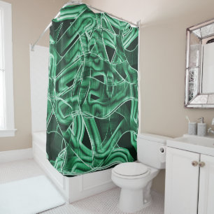 Overlapping and crossed green acrylic cutouts