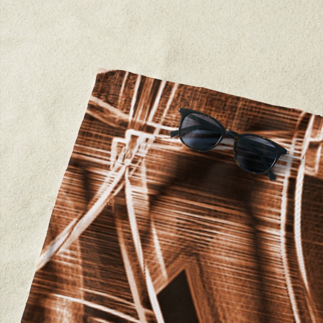 Overlapping curves in ribbon shapes, brown relief beach towel (In Situ)