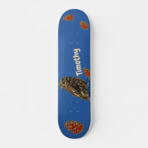 Owl and pine cones on a blue background skateboard