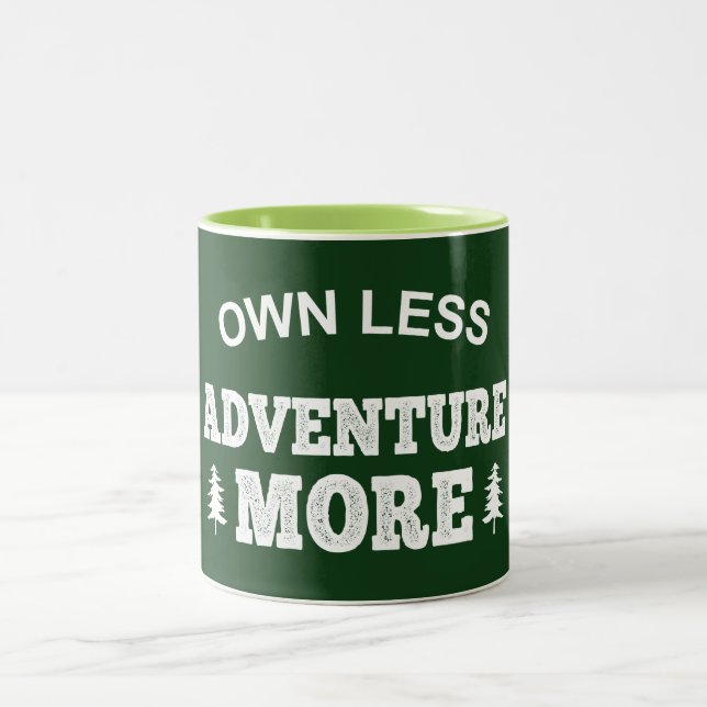 Own Less, Adventure More Two-Tone Coffee Mug (Center)