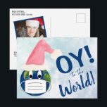 OY to the World Funny Face Mask Pandemic Holiday Postcard<br><div class="desc">This funny pandemic holiday postcard features a picture of the world with eyeballs wearing a face mask and Santa hat. The caption reads: OY! to the World! Because if ever there was a Oy Vay year, this has to be it. The back has space for your photo and a short...</div>