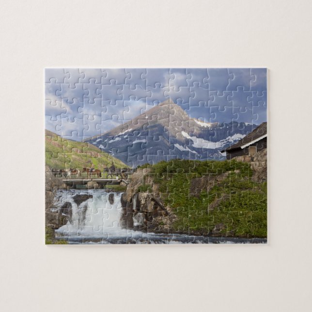 Packers lead string of horses over bridge above jigsaw puzzle (Horizontal)