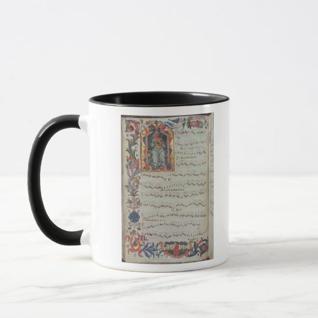 Page of musical notation with historiated mug (Left)