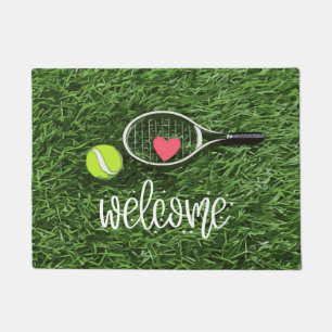 Paillasson Boule de tennis et raquette sur l'accueil vert