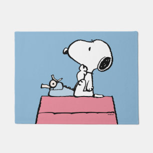 Paillasson cacahuètes Snoopy à la machine à écrire