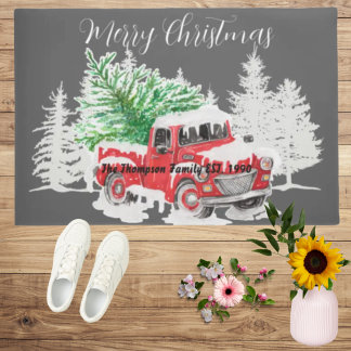 Paillasson Camion rouge vintage dans la neige nom de famille