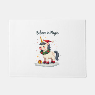 Paillasson Croire en la Magie Licorne festive portant un Noël