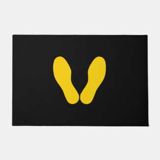 PAILLASSON EMPREINTES JAUNES SUR NOIR