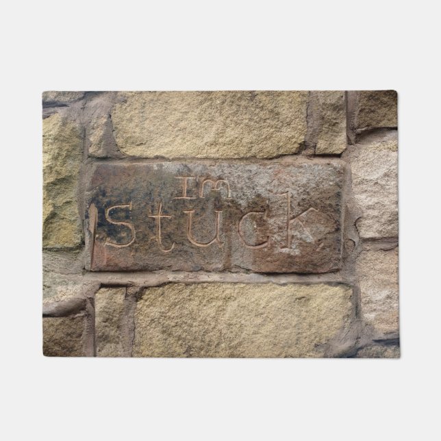 Paillasson "Je suis coincé" une autre brique dans le mur (Devant)
