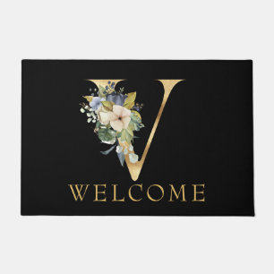 Paillasson Monogramme or classique V avec arrangement floral