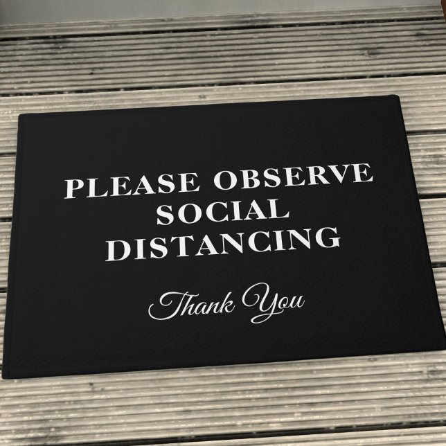 Paillasson Pot-de-porte en noir et blanc poli (A special doormat to remind everyone to keep their distance in style. Who said safety can't be chic?)