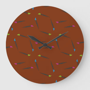 Paint brushes on brown large clock