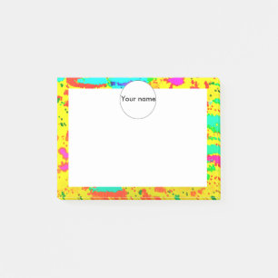 Paint splashes on a yellow background post-it notes
