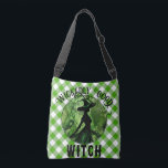 Painted Wickedly Good Witch Green Gingham Plaid Crossbody Bag<br><div class="desc">Painted Wickedly Good Witch Green Gingham Plaid Crossbody Bag - This cross body bag features a green and black painting of a wicked witch in an enchanted forest on top of a white and green gingham chequered plaid pattern. Designed for those who loves dark fantasy and spooky things. Make a...</div>