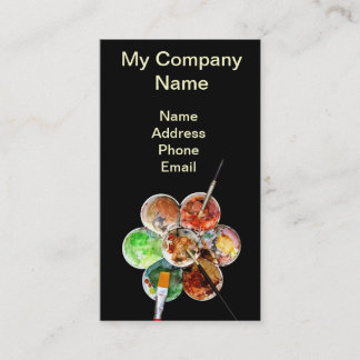 Painter's palette with bright colours and brushes business card