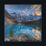 Painting on Moraine Magnet<br><div class="desc">This photo features Lake Moraine,  in Lake Louise,  Alberta. This shot is from the top of the rock pile a very classic shot. The reflection was just stunning at sunset with the colour in the clouds.</div>