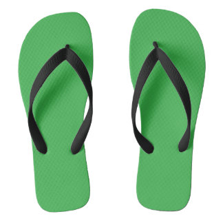 pair of green textured flip-flops with black strap flip flops