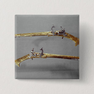 Pair of pistols, 1624-26 2 inch square button