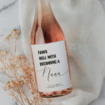 Pairs Well With Baby Announcement Nana Wine Label<br><div class="desc">Give your Mom or Mother in-law the ultimate surprise with this "Pairs Well with Becoming A Nana" wine label! This trendy, minimalistic design is the perfect way to share the exciting news of your pregnancy in a fun and memorable way. Simply attach the label to a bottle of wine (or...</div>