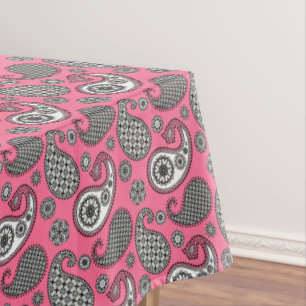 Paisley pattern, shades of grey on pink tablecloth