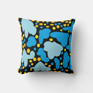 Pale blue puffs with lemon dots on black throw pillow