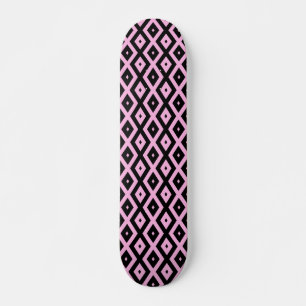 Pale pink and black diamond pattern skateboard