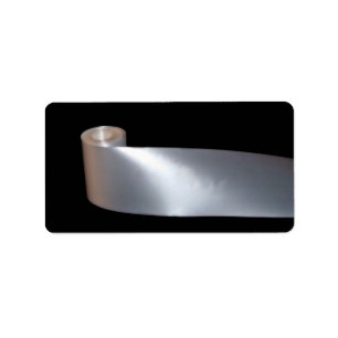 Pale Pink Ribbon Roll in black background Label