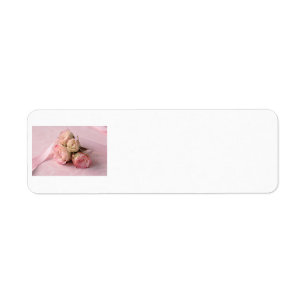 pale roses on pink swirls label