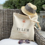 Palm Frond Destination Wedding Welcome Tote Bag<br><div class="desc">Welcome guests to your destination wedding with these chic and modern personalized tote bags. Design features a coral palm frond illustration with your wedding destination beneath (shown with Tulum) in classic serif lettering. Add your names beneath in handwritten cursive script, as well as the year. Colours can be changed to...</div>