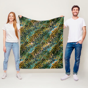 Palm leaves on a leopard background. fleece blanket