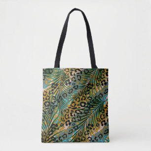 Palm leaves on a leopard background. tote bag