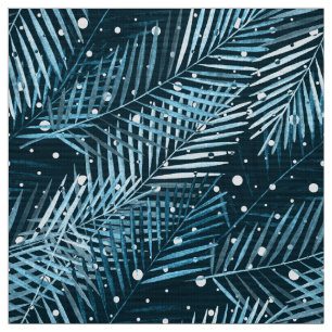 Palm leaves on blue with white polka dots. fabric