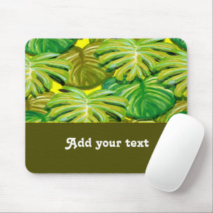 Palm leaves on yellow mouse pad